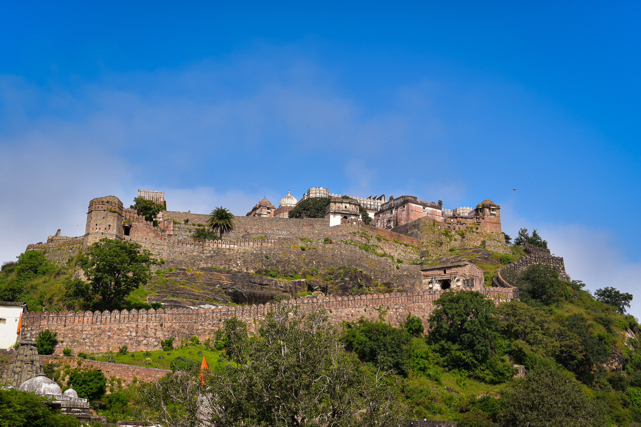 Wide heritage view of Kumbhalgarh Fort and its historic stone architecture.